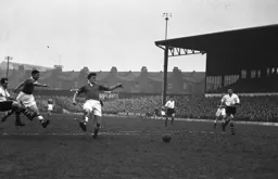 Fulham`s Jimmy Hill cannot prevent Jesse Pye from taking a shot at goal