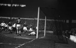 Fulham keeper Doug Flack saves from Arthur Taylor