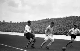 A City defender under pressure