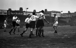 Town players celebrate after Gordon Turner scores one of his hat-trick goals