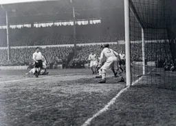 Gordon Turner is on the ground but he scores his and Town`s first goal of the afternoon