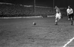 Bernard Moore in a race for the ball with City`s Tom Dryburgh