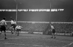 Hugh McJarrow loses out in this heading duel