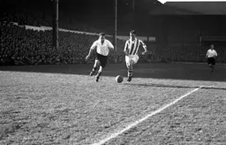 Jesse Pye in a tussle with Don McEvoy