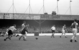 The chase is on as Bernard Moore goes after a loose ball