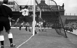 Everton keeper Harry Leyland tips the ball over the bar under pressure from Roy Davies