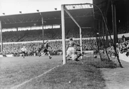 A mix up in the City defence leads to number 6 Tommy Dunne putting the ball into his own net for Town`s first goal