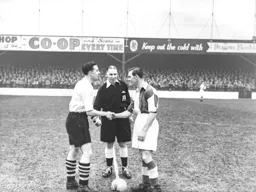 Skipper for the day, Bob Morton shakes hands with his Blackburn counterpart Bill Eckersley.