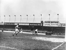 Bernard More over runs the ball