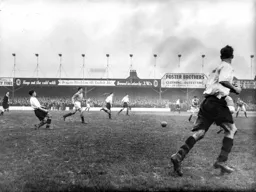 Bob Morton passes the ball forward