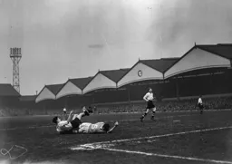Gordon Turner and Johnny Crosland go crashing to the ground