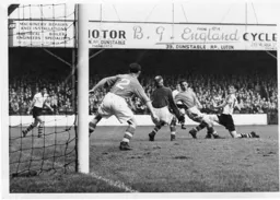 Forest keeper Harry Walker parries this effort by John Goves