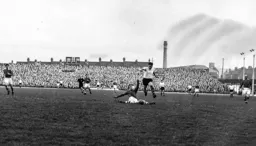 Gordon Turner rides a sliding tackle