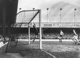 Gordon Turner watches Bob Morton`s hopeful cross shot drop into the net for Town`s first goal