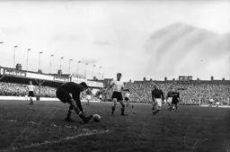 Jimmy Adam watches the ball go through to Charlie Ashcroft