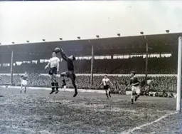 Monty Newlands had a busy afternoon. Here he takes the ball away from the head of Bob Morton