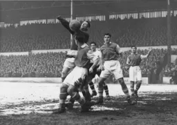 The Rotherham defence clear the ball