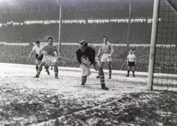 Gordon Turner is unable to trouble Bert Trautmann as he gathers the ball