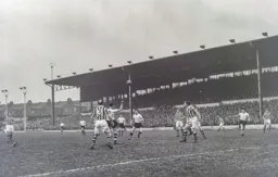Roy Davies heads the ball back towards Bob Morton