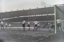 Charlie Watkins watches as Roy Davies header heads towards the net to put the Town 2-0 in front