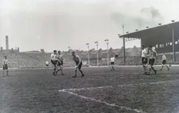 Roy Davies watches as Gordon Turner takes a shot at goal
