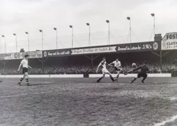 Jim Pemberton has his shot saved by Ray Chandler