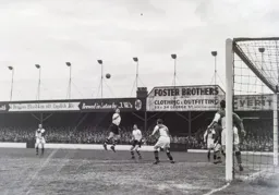 Peter MacEwan heads the ball up in the air