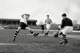 Roy Davies tries to get his toe to the ball