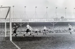 Johnny Hancocks briefly bring Wolves back into the game at 1-1. Ron Baynham and Syd Owen cannot save it