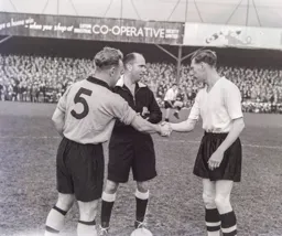 Syd Owen, Billy Wright and referee Mr Moore exchange pre match pleasantries
