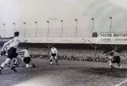 Jimmy Adam has the goal at his mercy but he is unable to convert