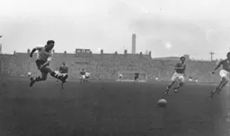 Peter MacEwan gets off the ground as he tries a shot at goal