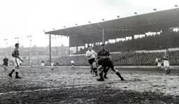Bob Morton gives up the chase as Jimmy O`Neill gathers the ball
