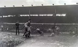 Bob Morton`s close range effort eludes future Hatter Gordon Fincham but it is saved by Johnny Anderson