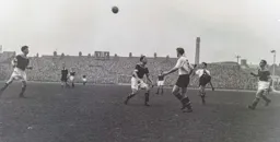 Jim Pemberton lobs a high ball into the penalty area
