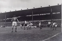 The Pompey defence clear the ball