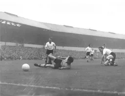 Terry Kelly brings the Wolves forward down. A penalty was given