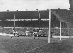 Gordon Turner is at full stretch to try and make contact with the ball