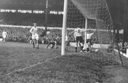 Jimmy Adam has squeezed the ball into the City net from a tight angle for Town`s second goal