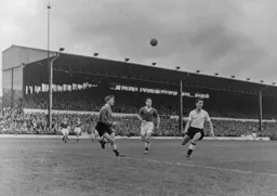 Reg Pearce searches for the ball