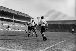 Bob Morton is kept at bay by Harry Clarke