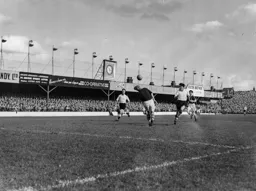 Gordon Turner chips the ball over Roy Wood for the Town`s first goal