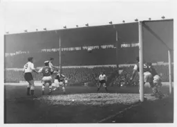 John Groves rises high to head the ball into the net and put Town 1-0 up