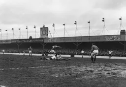 A penalty surely as Gordon Turner is sent crashing to the ground. But the referee deemed it was outside the penalty area