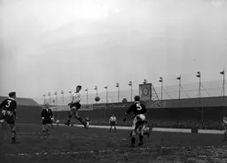 The ball eludes George McLeod