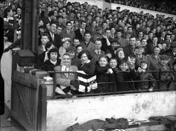 Town fans around the players tunnel