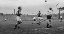 Bob Morton lofts the ball into the penalty area