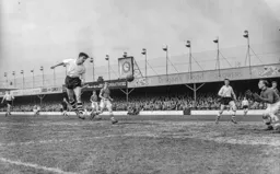 Gordon Turner makes a downward header