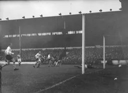 Mick Cullen, Bob Morton and Gordon Turner watch the ball goes just wide of the goal