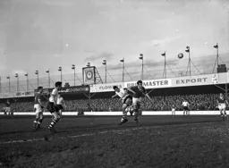 Allan Brown wins a header
